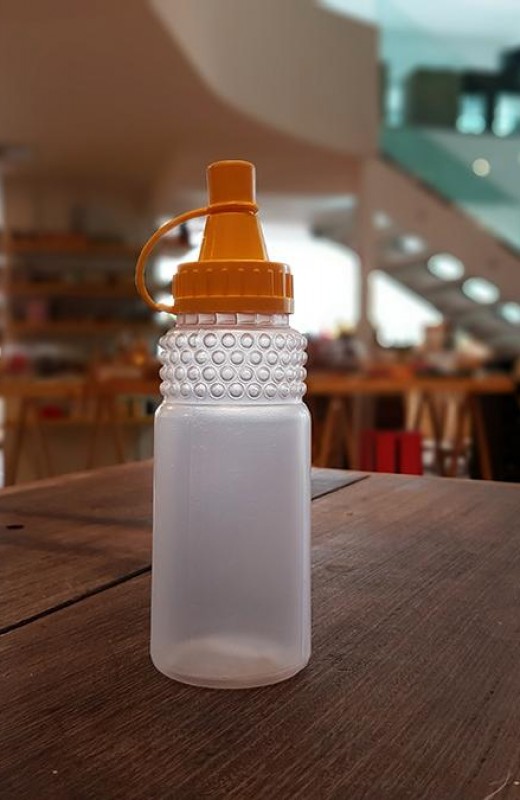 Detalhes do produto Bisnaga Plástica Mel 220ml com tampa